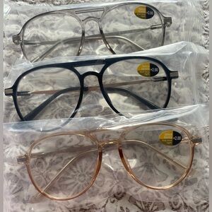 3 pairs of brand new readers in +2.00 strength.